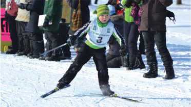 Child skiing competitively